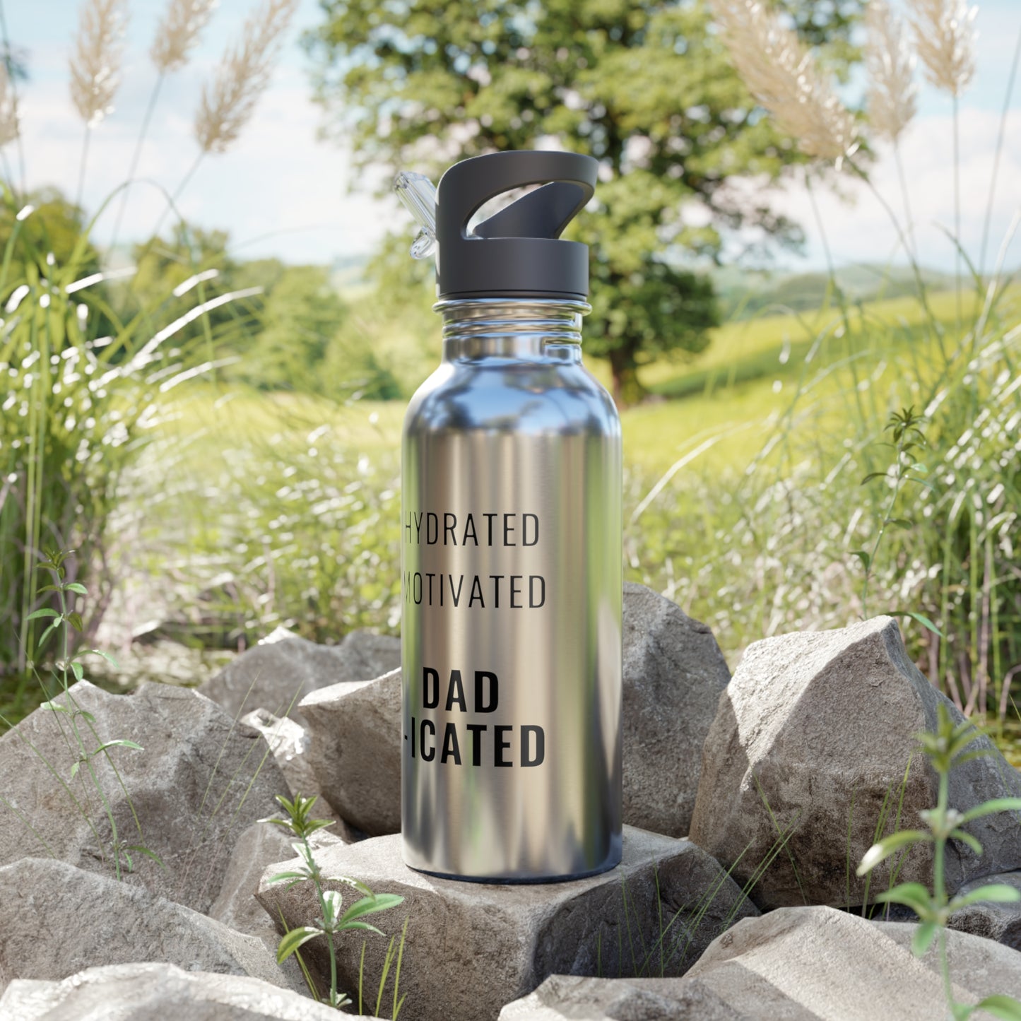 Side shot of stainless steel cycling water bottle with straw. Hydrated Motivated Dadicated